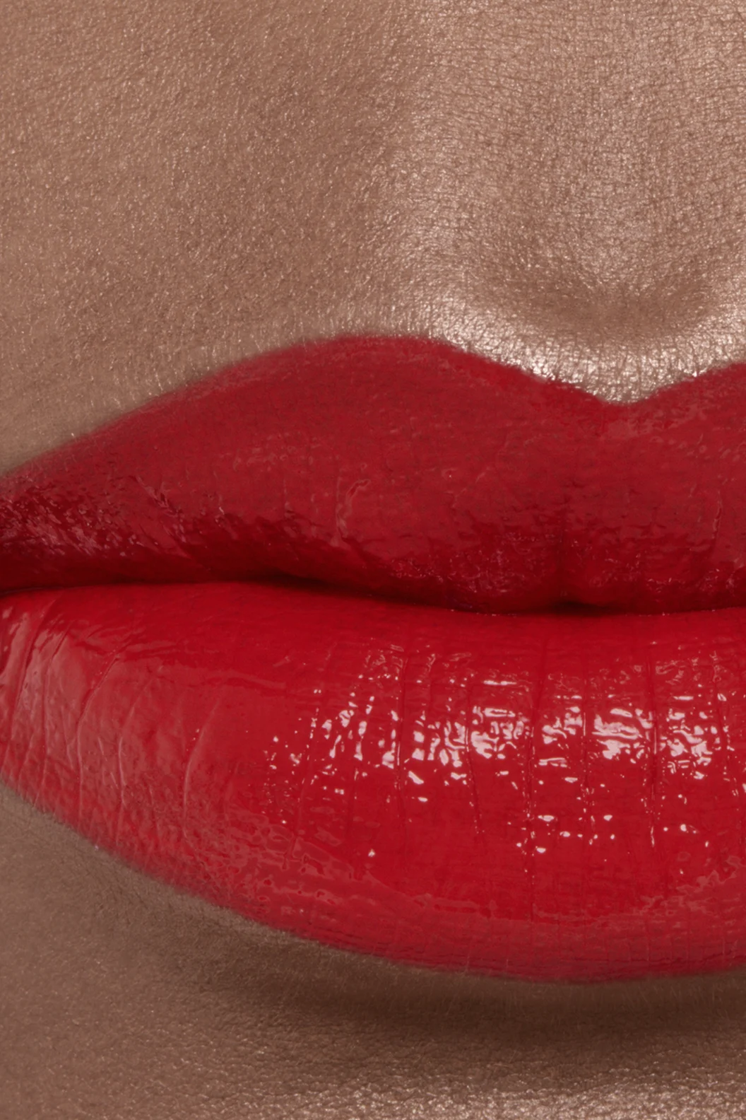 Chanel Rouge Coco Bloom 158 Bright red lipstick worn on skin