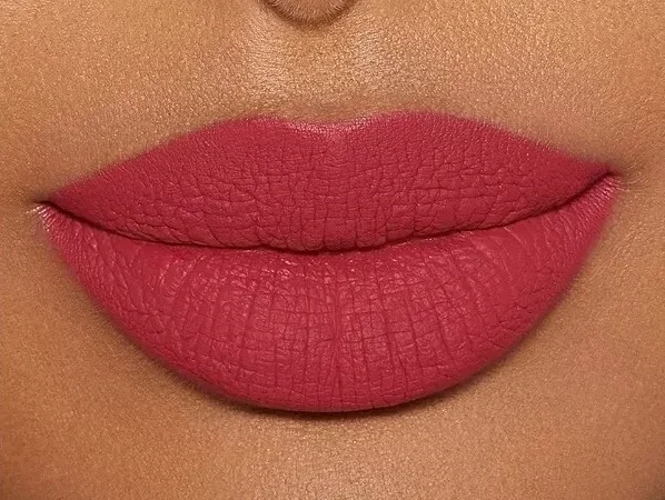 Cherry red lipstick on lips