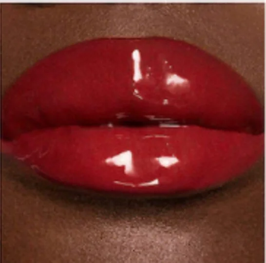 Dior Addict Lip Glow Oil 031 Strawberry, a sheer red, on deep skin
