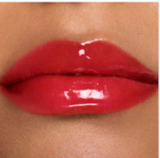 Dior Addict Lip Glow Oil 031 Strawberry, a sheer red, on medium skin