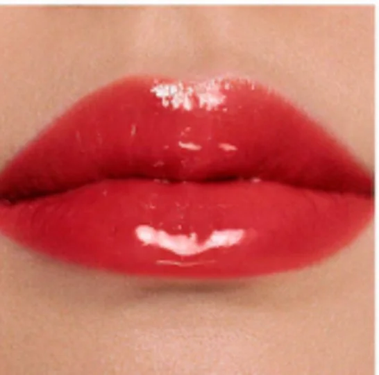 Dior Addict Lip Glow Oil 031 Strawberry, a sheer red, on light skin