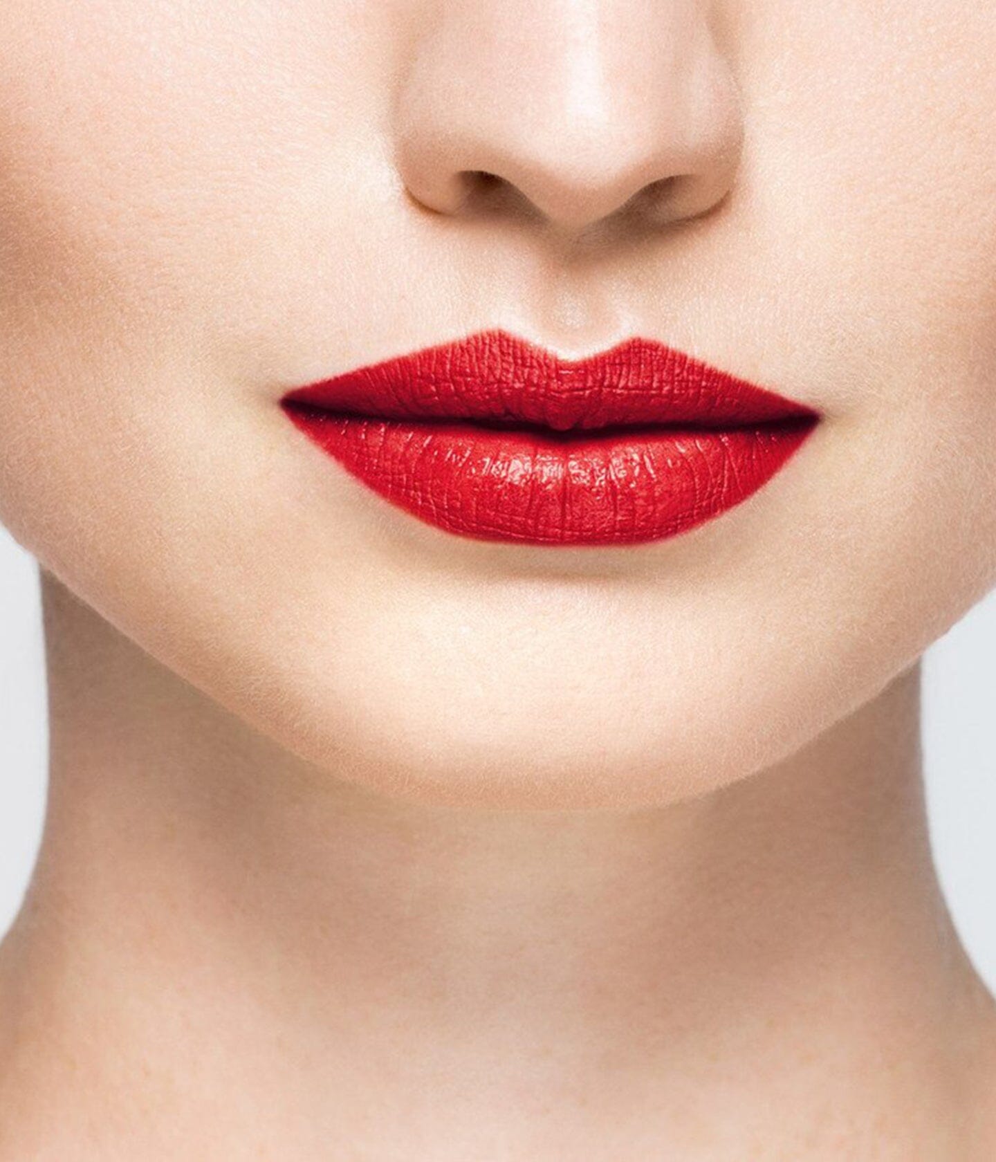 La Bouche Rouge 21 Satin red lipstick worn on skin