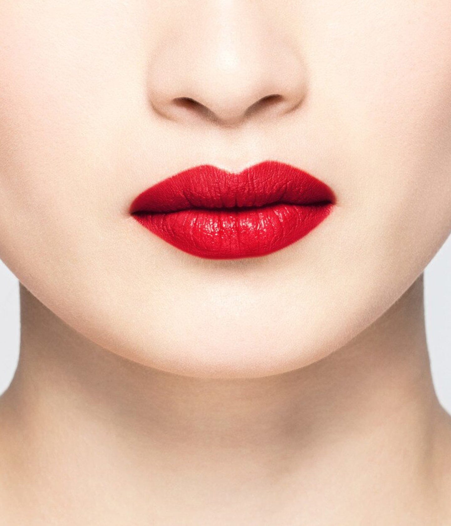 La Bouche Rouge 21 Satin red lipstick worn on skin