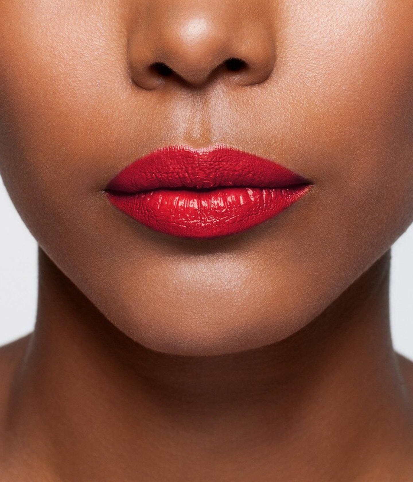 La Bouche Rouge 21 Satin red lipstick worn on skin