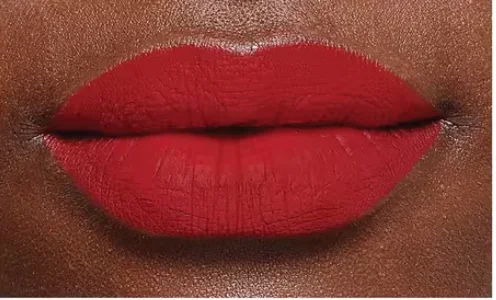 L'Oréal 193 Le Rouge Determination red lipstick worn on three skin tones