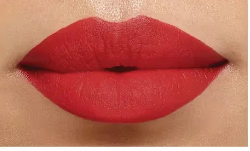 L'Oréal 193 Le Rouge Determination red lipstick worn on three skin tones