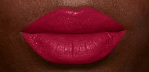 NYX Monte Carlo, a black cherry red lipstick, on lips