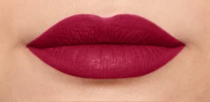 NYX Monte Carlo, a black cherry red lipstick, on lips