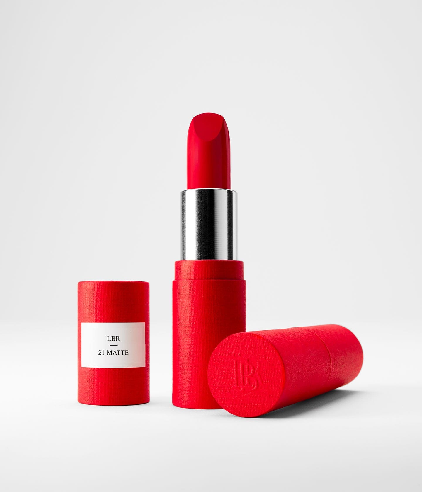 La Bouche Rouge 21 Matte red lipstick in a red refillable vegan case with magnetic clasp