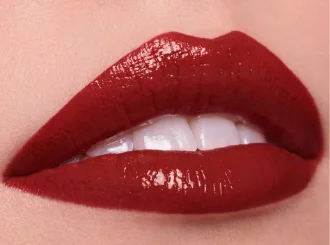 Dior oxblood red lipstick on lips