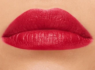 MAC Ruby Woo red lipstick on deep skin