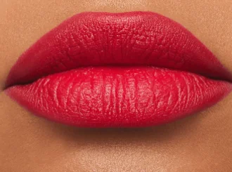 MAC Ruby Woo red lipstick on medium skin