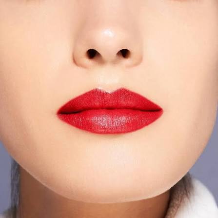 Shiseido fire-engine red lipstick on lips